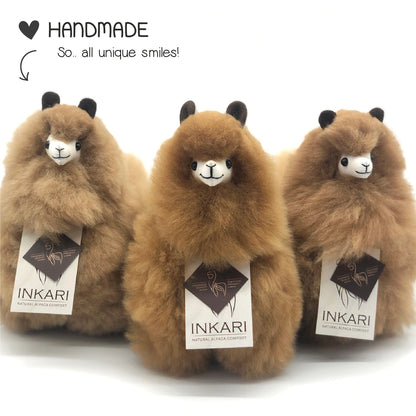 Hazelnut INKARI Natural alpaca stuffed animal — close-up showing soft alpaca wool texture and gentle face