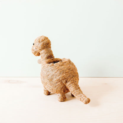 Brontosaurus-kruka i kokosfiber bakifrån