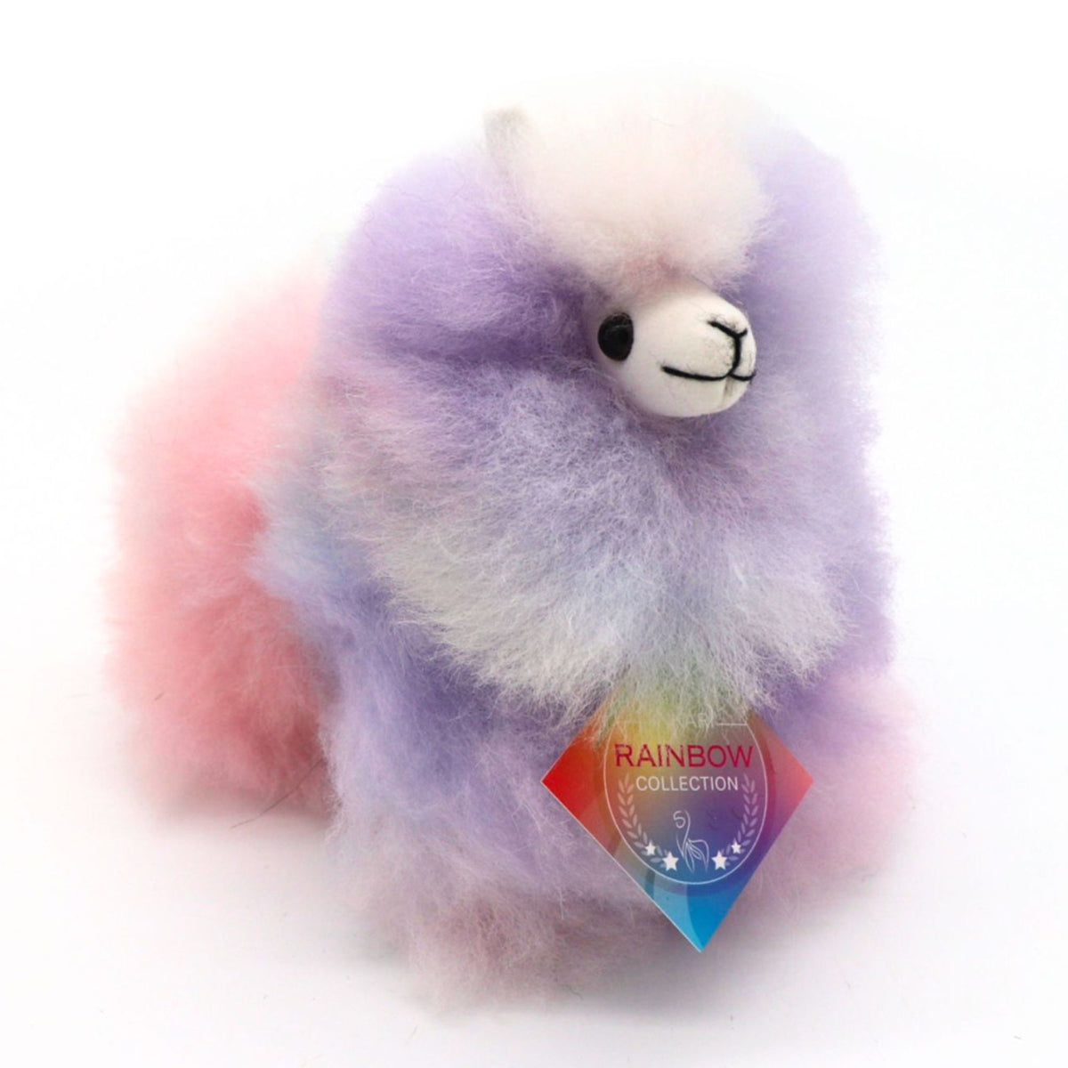 Galaxy INKARI Rainbow alpackagosedjur — sedd i profil som visar en fluffig man och naturliga ulldetaljer